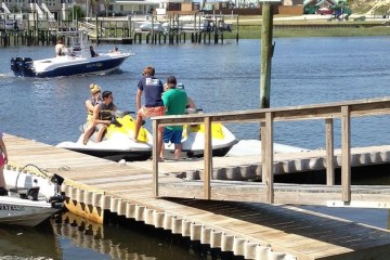Jet skis leaving from the doc